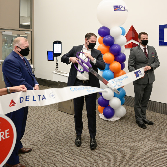Ribbon Cutting for first flight of Concourse A