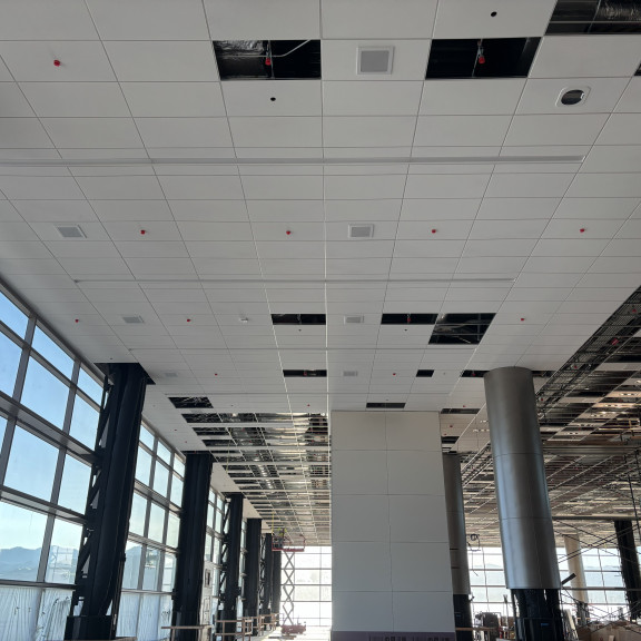 Phase 4 passenger hold room ceiling tile install april 2026